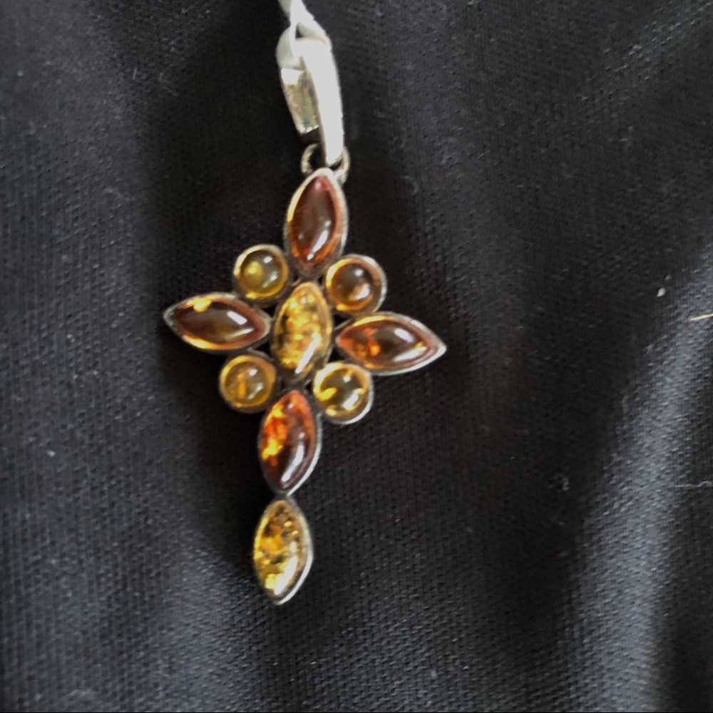 Amber and sterling silver cross pendant with bezel